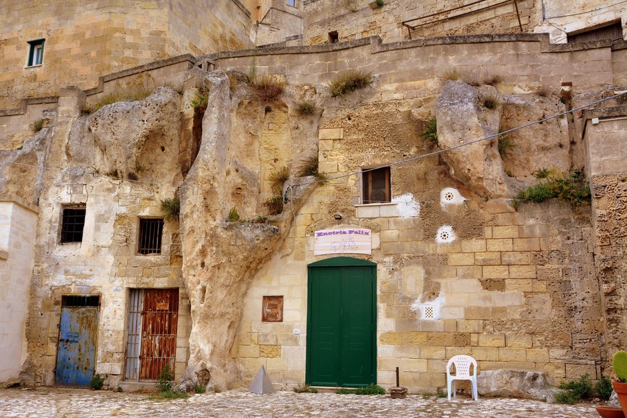Cave dwelling facade with green door