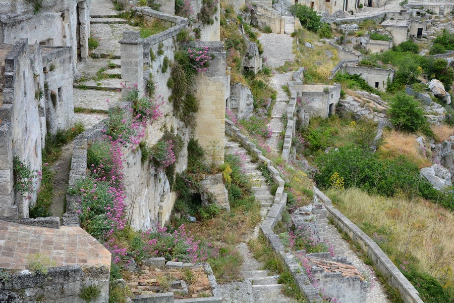 Abandoned Sassi with wildflowers in spring