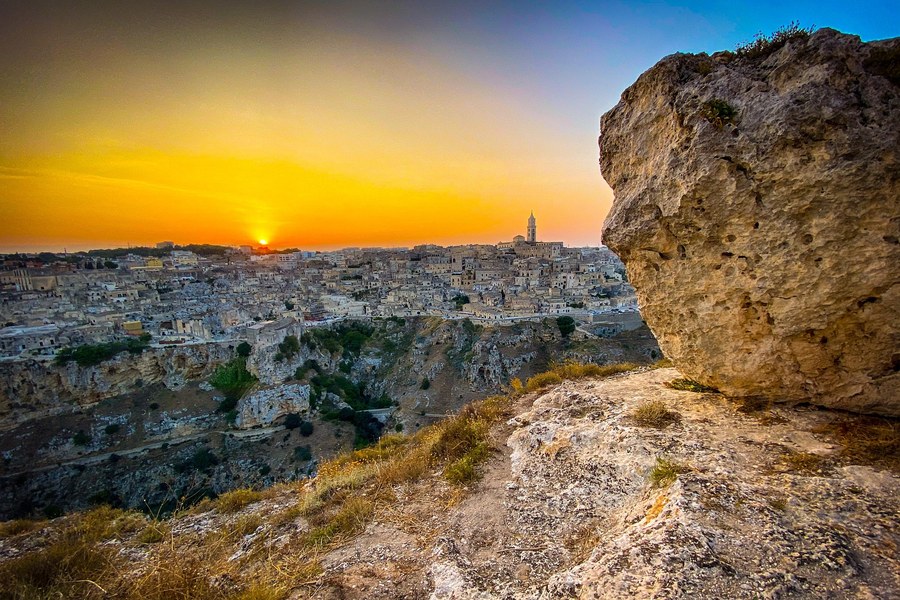 Matera at sunset from the Murgia plateau